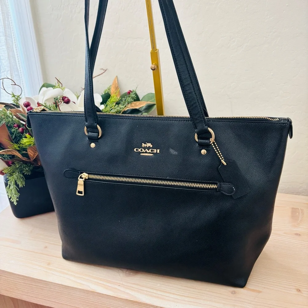 Coach sleek black